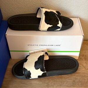 APL Women's Iconic Slide Sandals in Black & White Cowhide